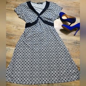 Elementz size Medium V neck twist fit & flare style dress back ties